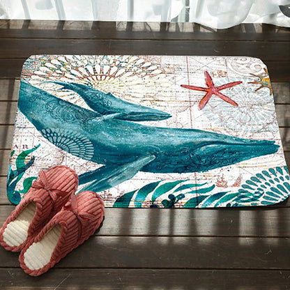 Marine-pattern toilet mat with blue whale, starfish, and shell graphic, non-slip backing