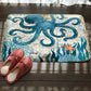 Octopus printed flannel bath mat with non-slip backing, teal and cream