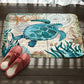 Turtle printed flannel bath mat with non-slip backing, blue teal and cream