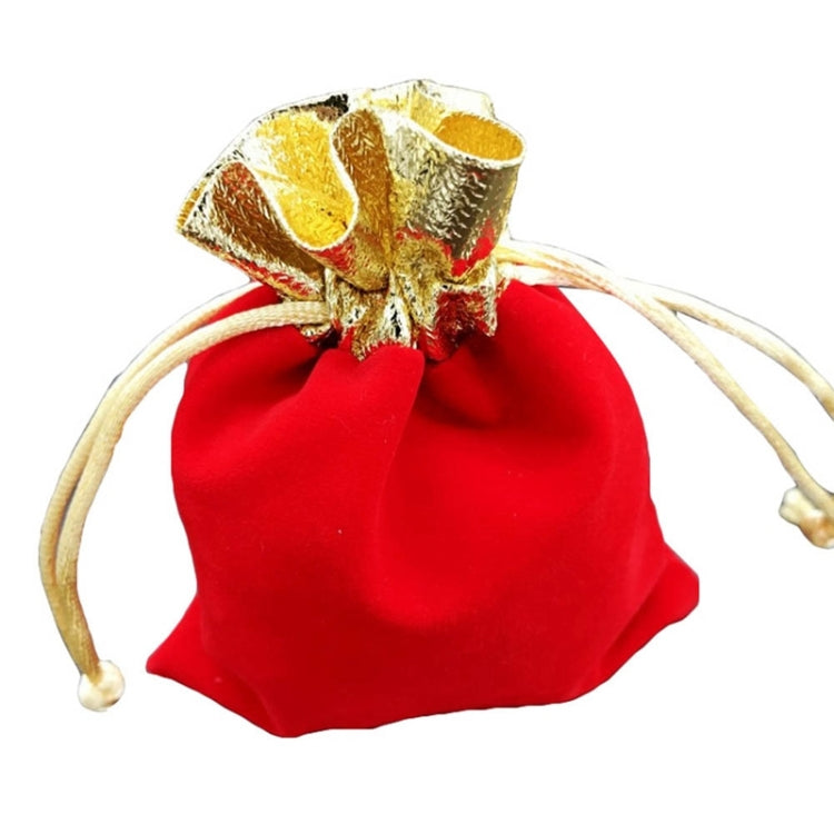 Red velvet drawstring jewelry pouch with gold bow and beige tie cords