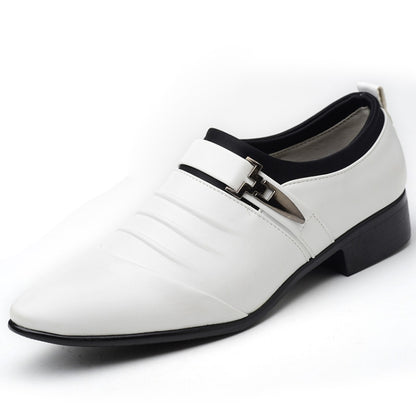 White men’s slip-on oxford dress shoes with pointed toe, black trim, and metal strap detail