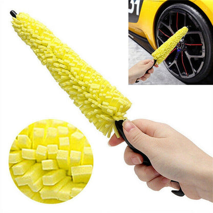 Yellow wheel cleaning brush with plastic handle and sponge bristles
