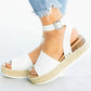White one-button buckle platform wedge sandals with ankle strap and braided espadrille sole