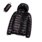 Black hooded puffer jacket with quilted panels, zip-front closure, and carry pouch