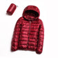 Red hooded puffer jacket with full-zip front and quilted baffles