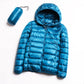 Women’s hooded puffer jacket in blue, front zipper, quilted insulated design