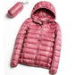 Women’s hooded puffer jacket in light pink, front zipper, quilted warm coat