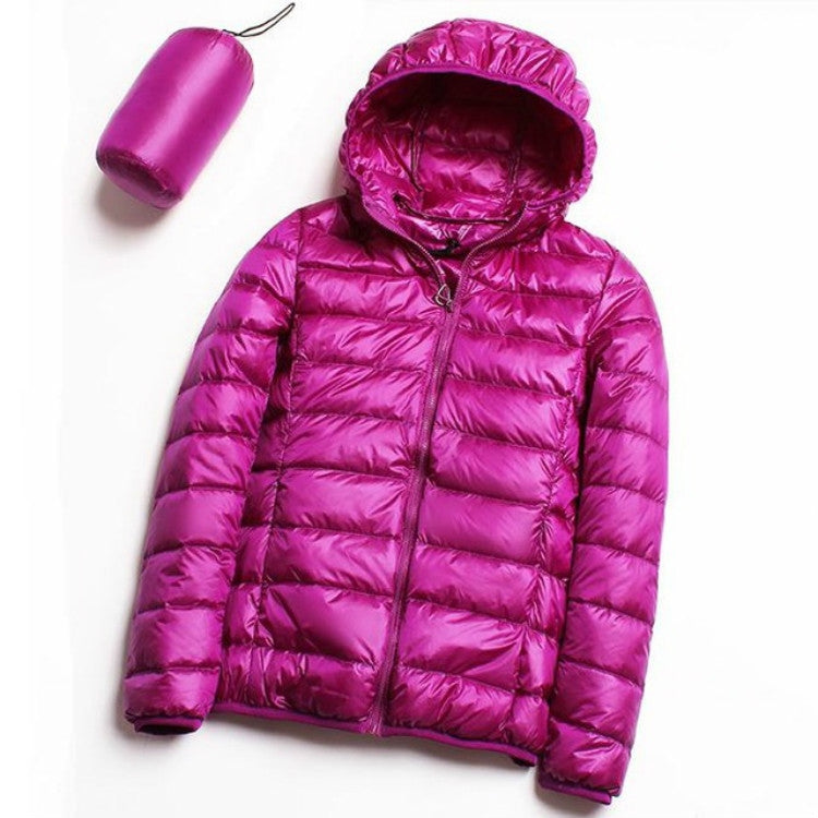 Women’s hooded puffer jacket in fuchsia pink with full-zip front and quilted insulation