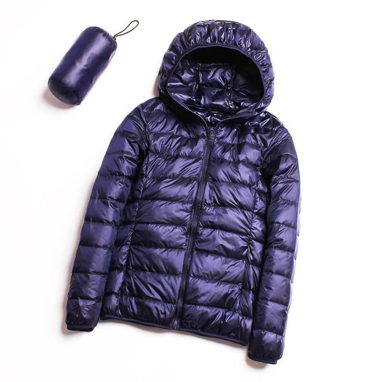 Women’s hooded puffer jacket in dark blue with full-zip front and quilted insulation