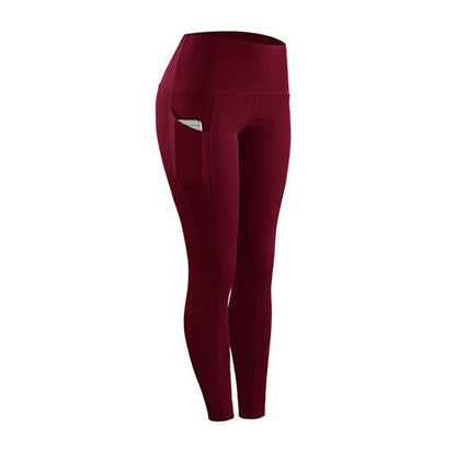 High-waist leggings in deep red with side pocket detail