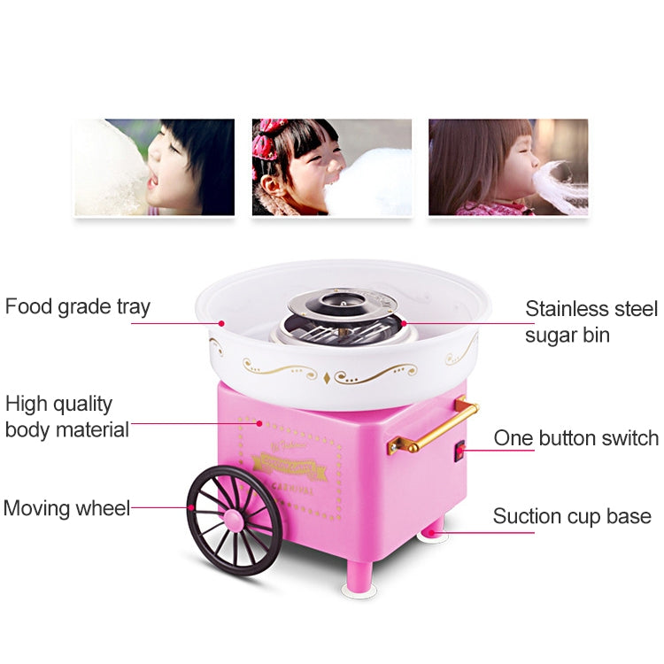 Pink retro cotton candy trolley machine with white sugar bowl, gold handle, and front wheel.