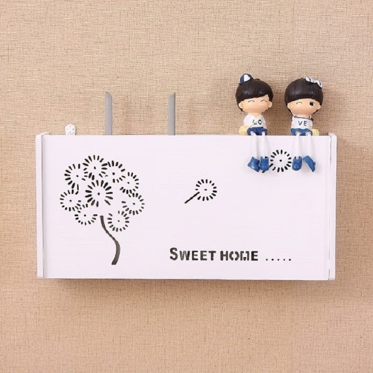 White wall-mounted router storage box with flower tree cutout and short text, two side rods