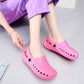 Pink slip-on medical clogs on feet with perforated upper and heel strap