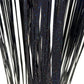 Dark foil tinsel curtain with glitter speckled vertical strands, held up.