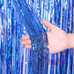Laser rain tinsel foil curtain, blue glitter tinsel strands, tied top bundle held