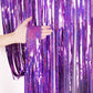 Laser rain tinsel foil curtain, purple glitter strands tied at top, hand parting strands