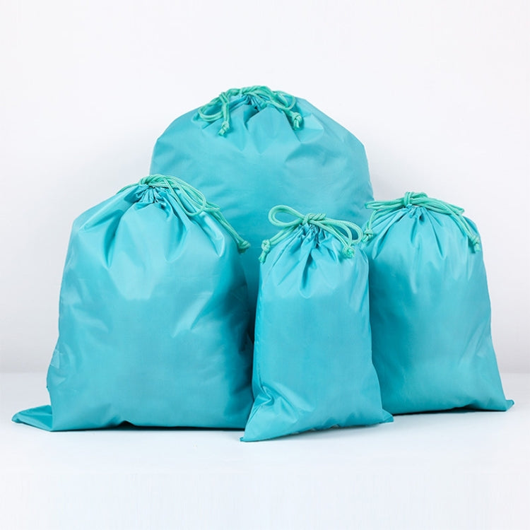 Set of sky blue nylon waterproof travel storage bags with drawstring cords, 4 sizes