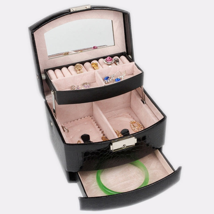 Black jewelry storage box with divided trays and ring slots, lid open