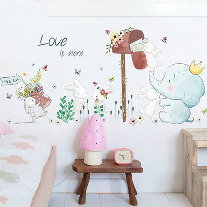 Kids wall sticker set with “Love is here” text, elephant, bunnies, flowers, butterflies