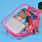 Clear PVC makeup storage bag with pink border and zipper, holds cosmetics