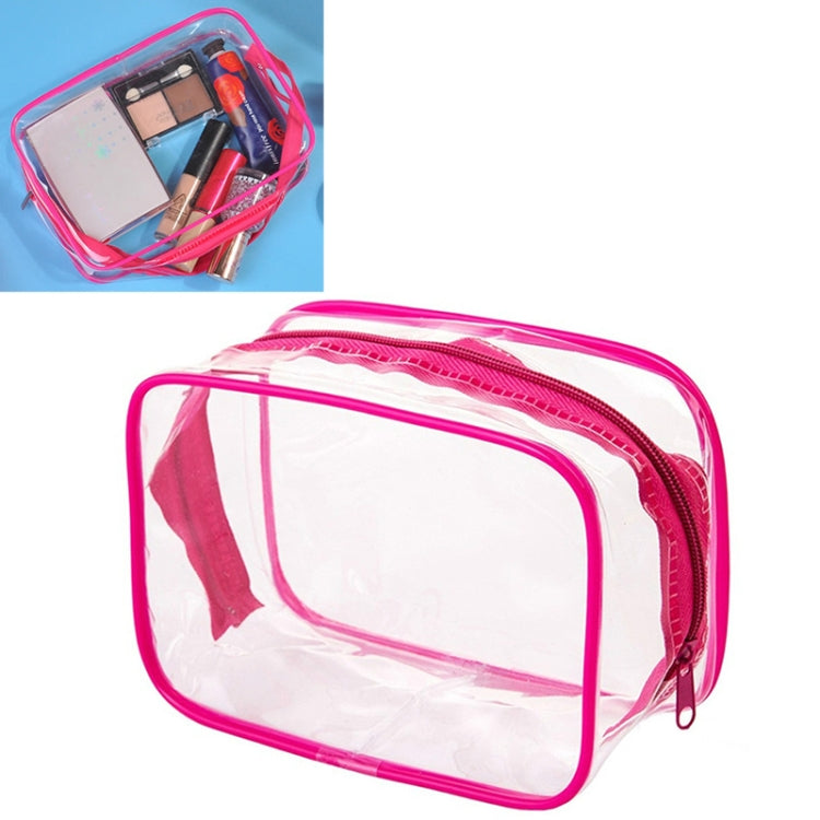 Clear PVC makeup bag with pink border, front zipper and carry handle, rectangular