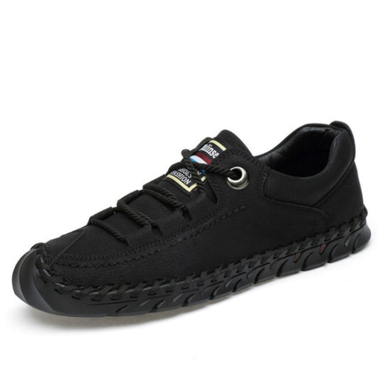 Black lace-up casual leather shoes with round eyelets and textured rubber sole