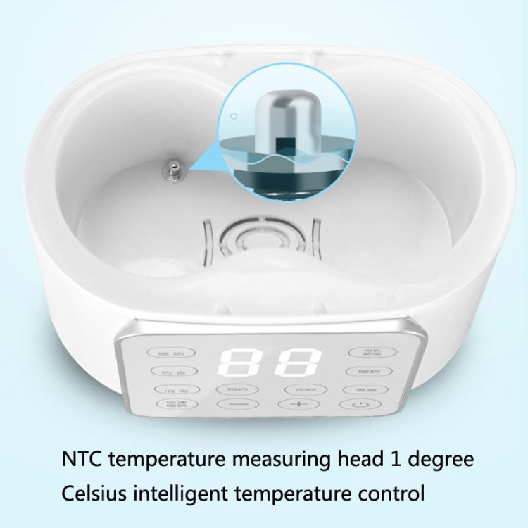 Double bottle warmer interior with heating chamber and front control panel
