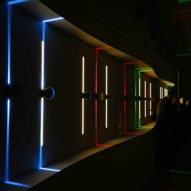 LED semicircle wall spotlights in a long row with multicolor linear illumination