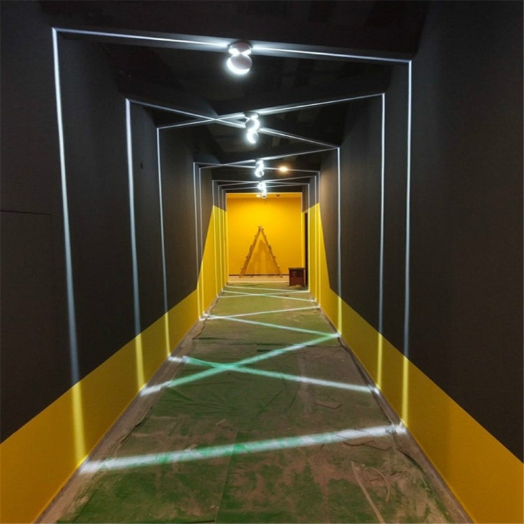 LED semicircle wall spotlights lining a hallway with bright white light strips