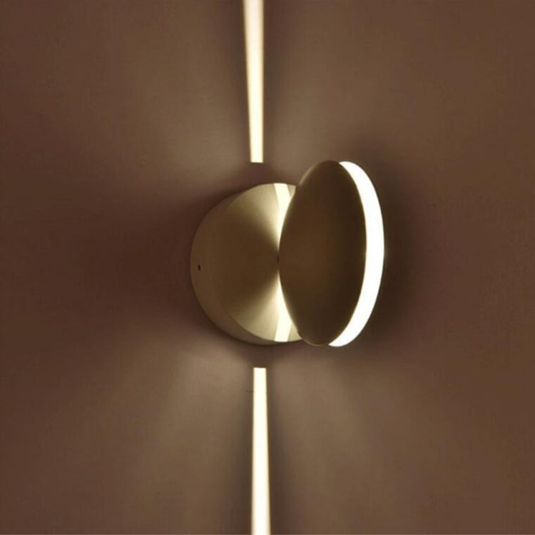 White LED semicircle wall spotlight with warm glow projecting along the wall
