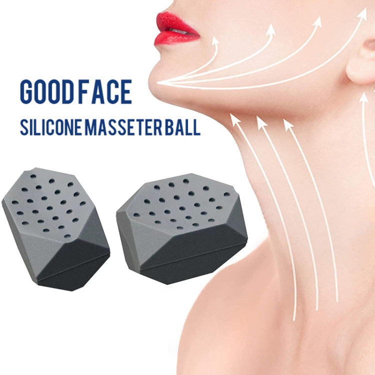 Silicone masseter ball jaw exerciser, gray hexagonal dotted pad beside face model