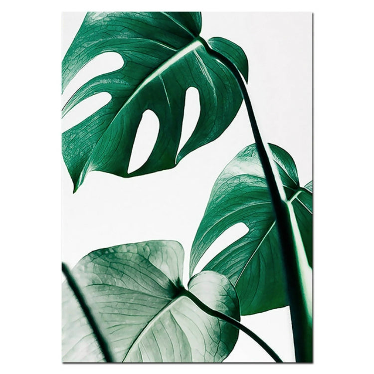 Green tropical leaf art poster print with layered monstera leaves close-up