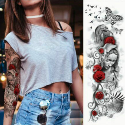 Large arm sleeve temporary tattoo sticker with grayscale face, red roses, and butterflies.