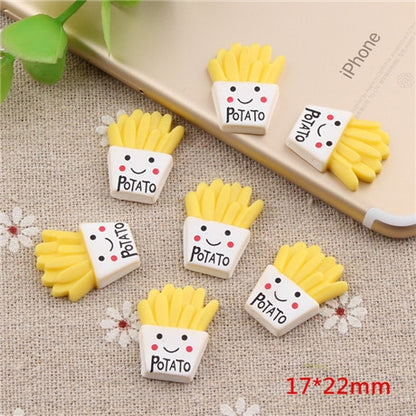 French fry resin charms set with yellow fries and smiling “Potato” faces