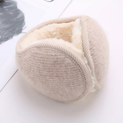 Beige plush knitted earmuffs with furry ear pads and ribbed outer band