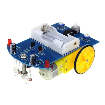 DIY electric tracking car kit circuit board with yellow wheel and sensor parts