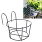 Black round metal flower pot stand with two-tier circular basket, angled side view