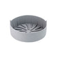 Gray round silicone grill pan insert with ridged radial channels and center hub