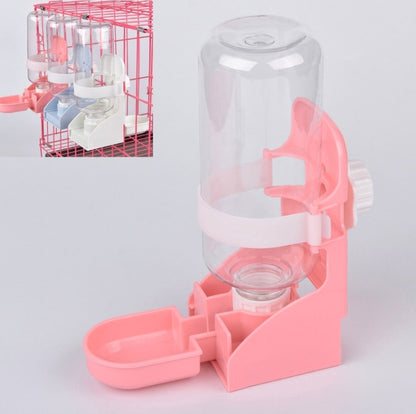 Pink automatic pet water dispenser with transparent bottle and drinking tray