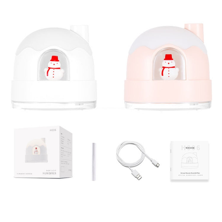 Snowman humidifier night light in white and pink, with USB cable and packaging.