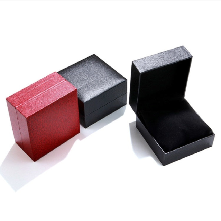 Flip watch boxes in red and black PU leather, open padded interior