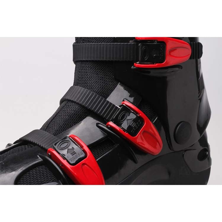 Black and red jumping shoe with red buckle straps and gray molded panels