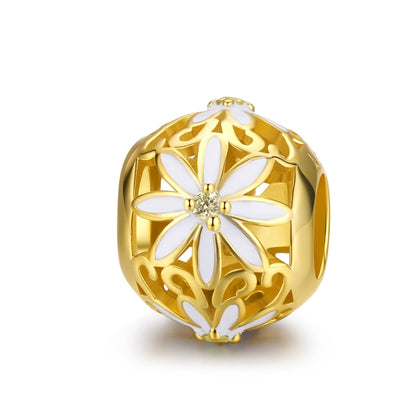 Gold daisy charm bead with white flower center and cutout petals