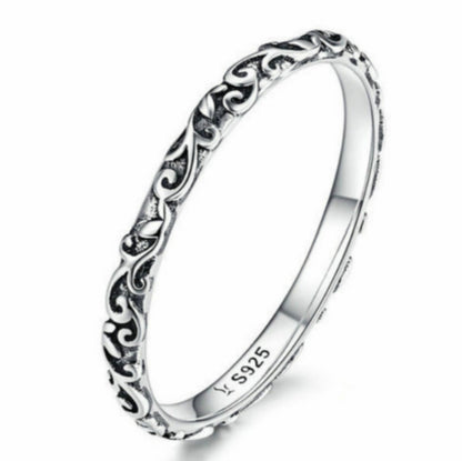 Sterling silver 925 pattern band ring with ornate scrollwork, polished finish