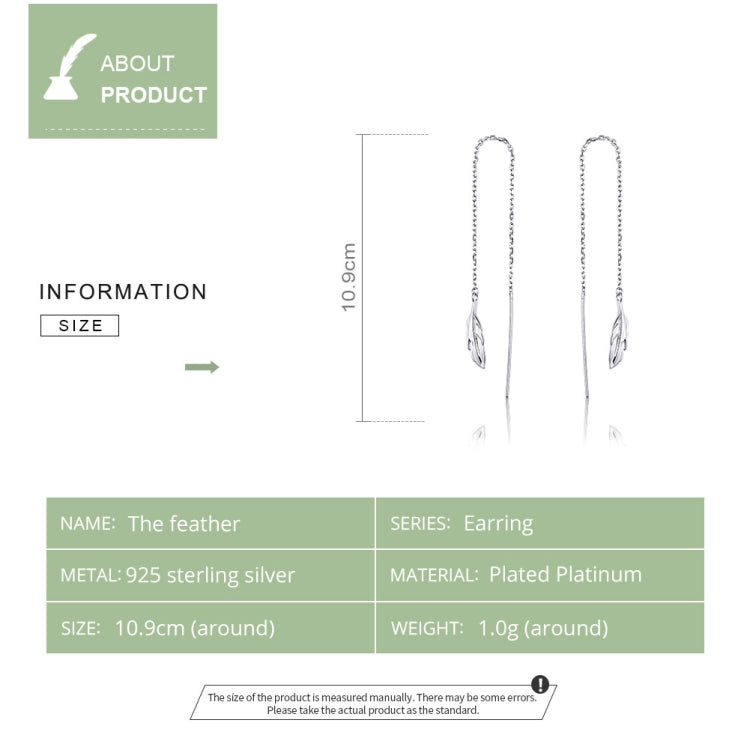 Long silver-tone feather earrings shown with size markers, two drops visible