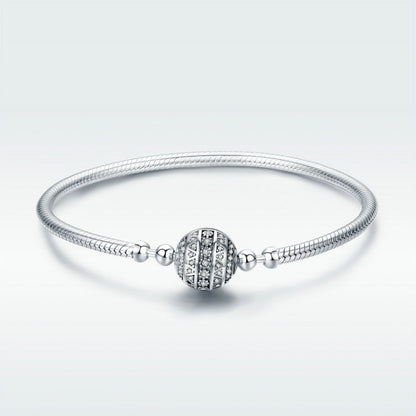 Sterling silver bangle bracelet with round paved bead and side spacer charms