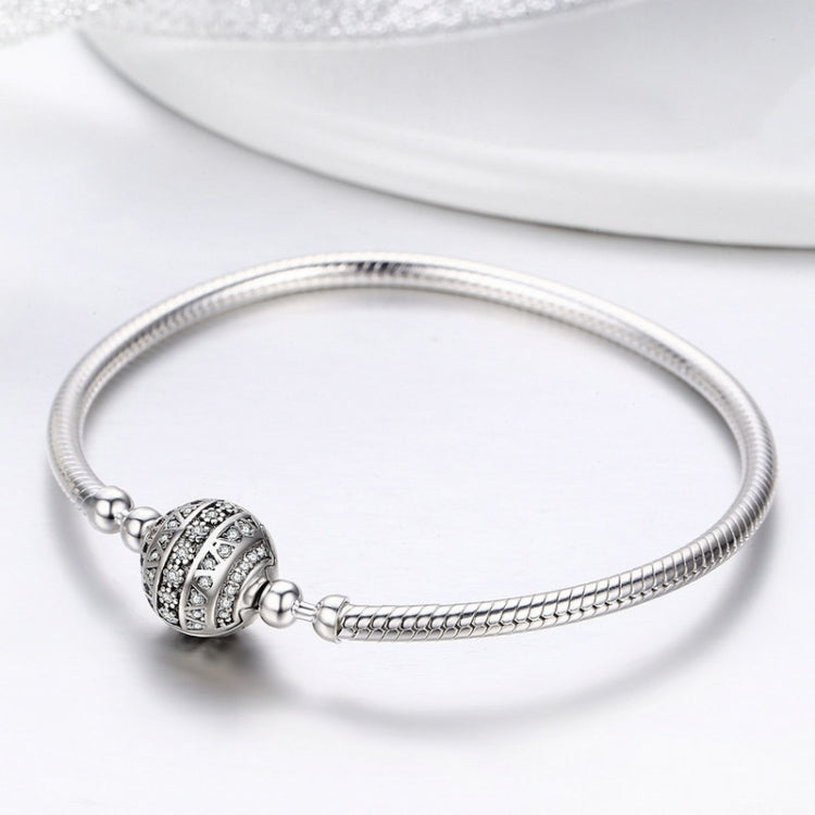 Sterling silver charm bangle with round pave bead detail and linked connectors