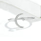 Sterling silver open crescent zircon ring with flower-stone charm on band