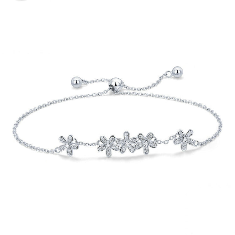 Sterling silver daisy charm bracelet with five flower motifs and adjustable chain