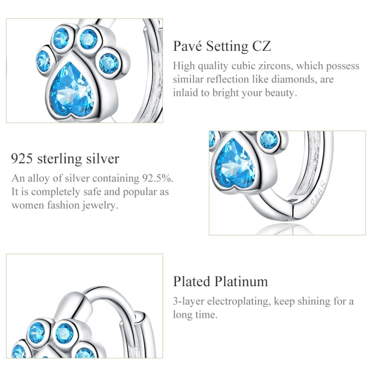 Sterling silver cat paw print hoop earring with blue zircon paw pad stones